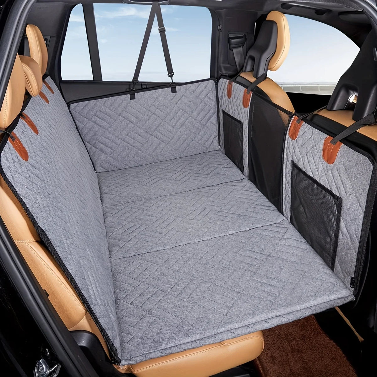 RoadNest waterproof dog hammock seat cover installed in a back seat